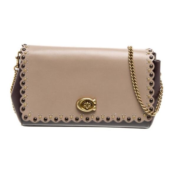 Coach Handbags - Luxurious 2019 Coach Alexa bag with a scalloped flap and studs in color block